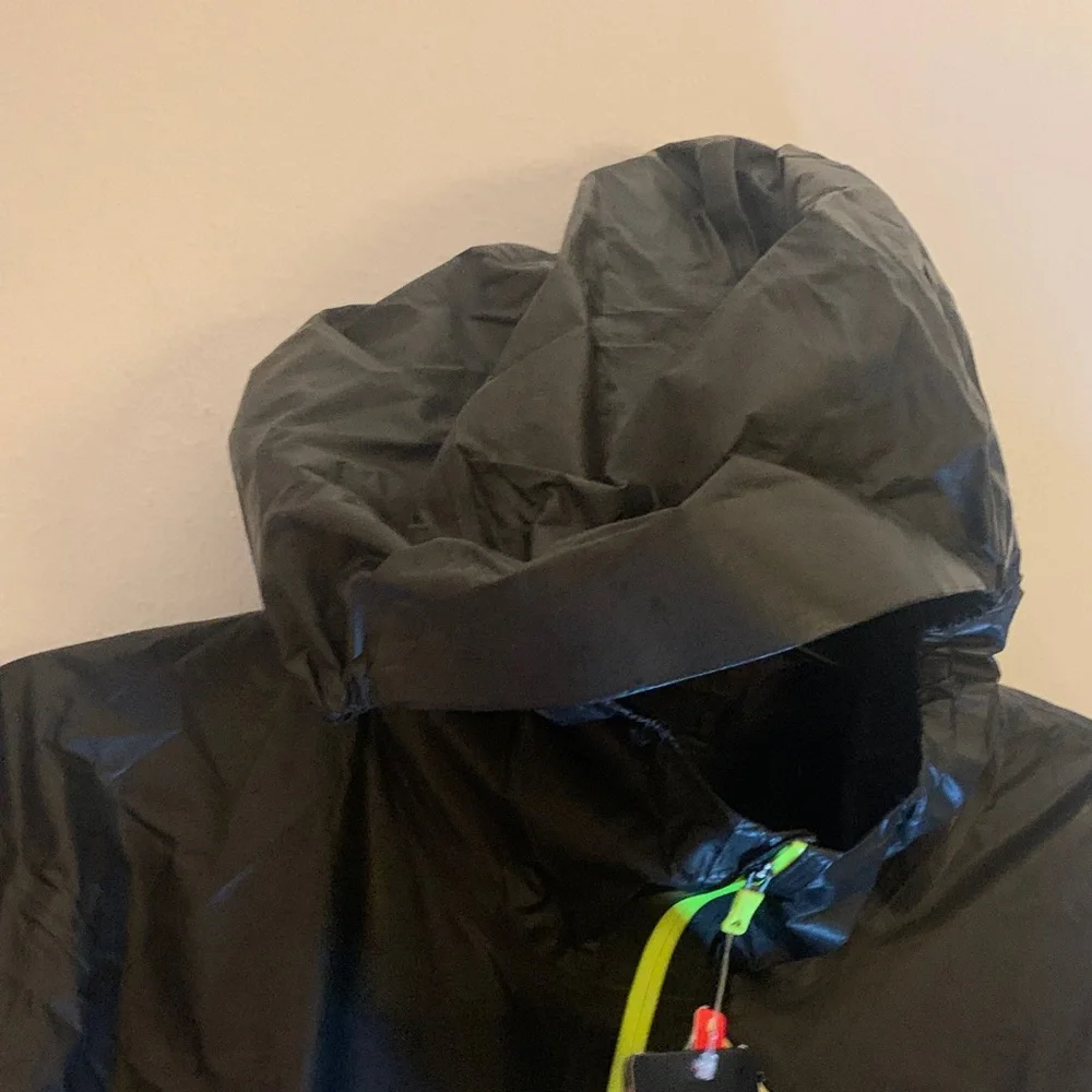 The North Face Men's Black Raincoat with Bright Yellow Zipper